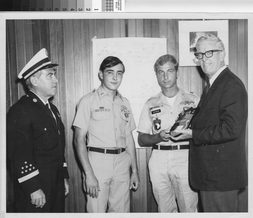 Army photo - plaque presentation to H. Wayne 9/4/69