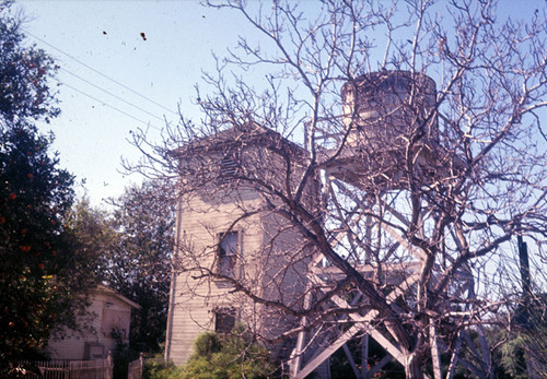 View of Water tower, at the rear of Thompson home located at N W corner West & Garden Grove, March 1965