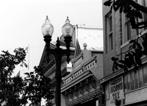 View of buildings and street light in the 100 block of E. 4th, 1993