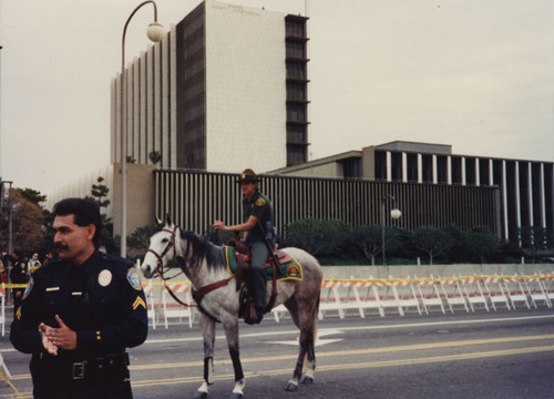 Mounted policeman on Flower Street near Civic Center Drive, March 2, 1990