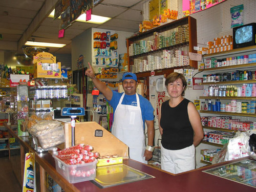 Employees at the front counter of the Fiesta Imperial Market on Fourth Street, August 2002