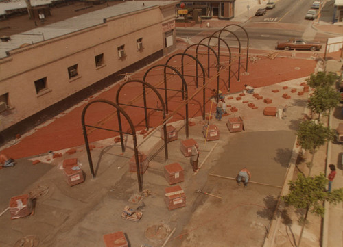 Brick pavers being laid at the Fiesta Marketplace area on Spurgeon Street