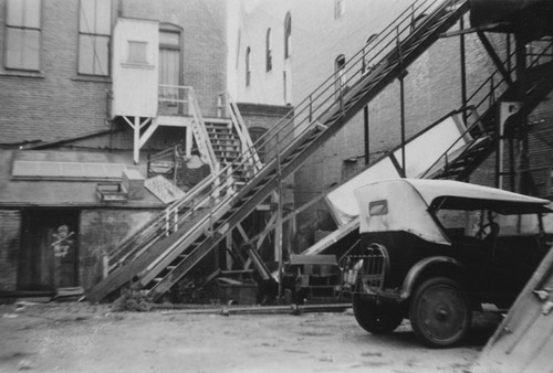 Demolishing the Grand Opera House, back side, on 203 E. 4th St. about 1930