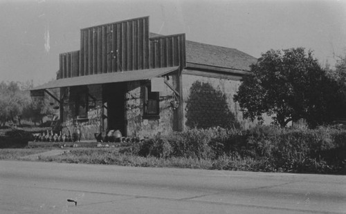 N. W. view of the Marquez Saloon adobe in 1935