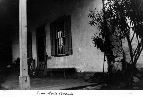 View of the Veranda of the Juan Avila adobe on the west side of Central Street in Capistrano Village