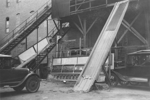 Demolishing the Grand Opera House on 203 E. 4th St. about 1930