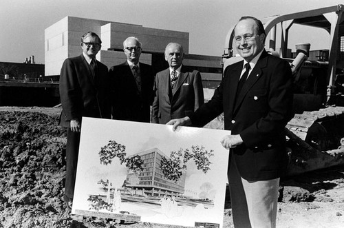 Groundbreaking with Mayor Griset holding architect's sketch for State of Calif. office buiding
