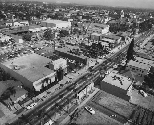 Roof tops and signs of construction looking south on Broadway