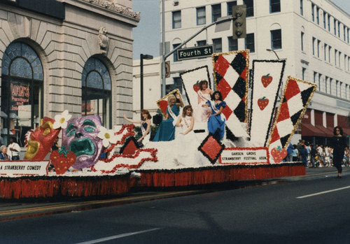 Float entered by the Garden Grove Strawberry Festival moving south on Main Street during the Santa Ana Golden City Days parade, October 17, 1987