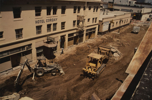 View of the construction vehicles on Spurgeon Street outside the Hotel Corday