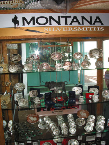 Silver belt buckles on display at a shop in El Faisan on Fourth Street, August 2002