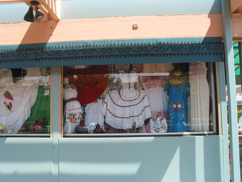 Window display of traditional Mexican dresses at El Faisan on Fourth Street, August 2002