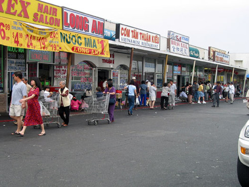 Shoppers on the corner of Bolsa and Magnolia