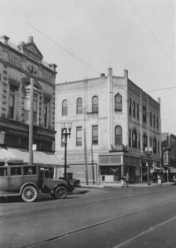 View from the corner of Bush and 4th St. looking East of the Grand Opera House (N. E. corner) on 203 E. 4th St. about 1930