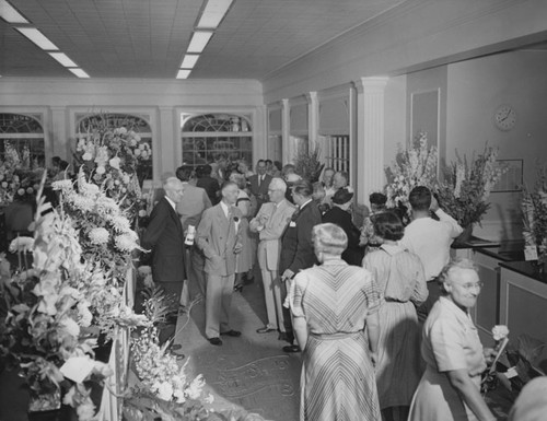 Crowd at the opening of the First Federal Savings and Loan Association on 506 N. Broadway in 1951