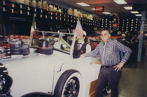 Ray Rangel in his shop, R & R Sportswear on 308 E. 4th Street — Calisphere