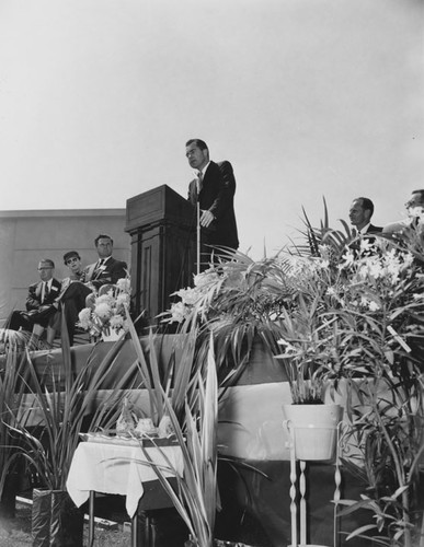 President Richard Nixon and a group of dignitaries on the speaker's platform