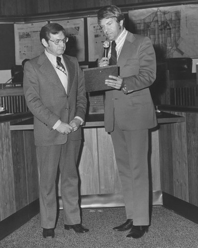 Congressman Andrew J. Hinshaw presented with a City seal tile and resolution of commendation by Santa Ana mayor Jerry Patterson, July 2, 1973