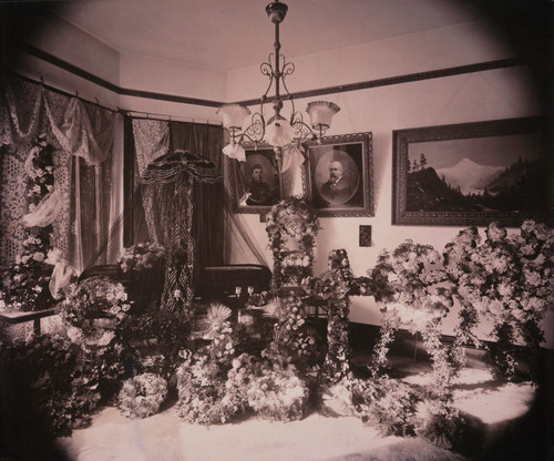 Casket of Frederick Franck in the parlor of the Franck Mansion at the corner of Washington & Benton Sts., Santa Clara, 1902