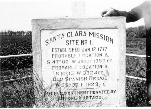 Engraved base of Cross erected at first site of Mission Santa Clara