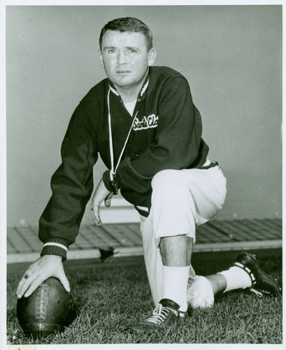 Pat Malley in football pose — Calisphere