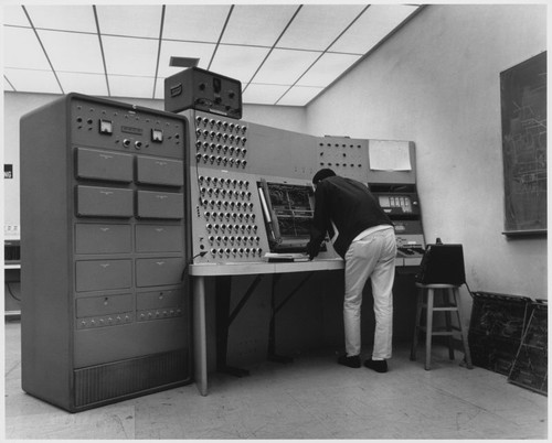 Student works on analog computer, ca. 1965 — Calisphere