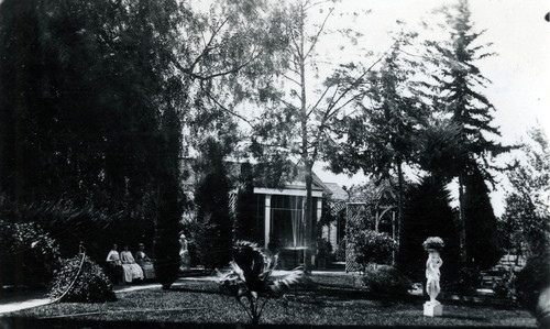 View of Nimock's front porch with family members