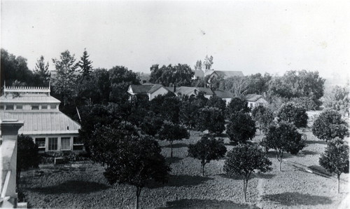 Nimock's property with conservatory and carriage barn in background