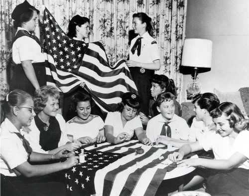 Girl Scouts prepare new 50-star flags for the City Council