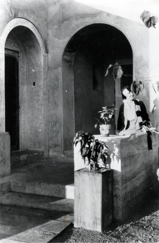 Marie Rankin Clarke on her porch at the Clarke Estate