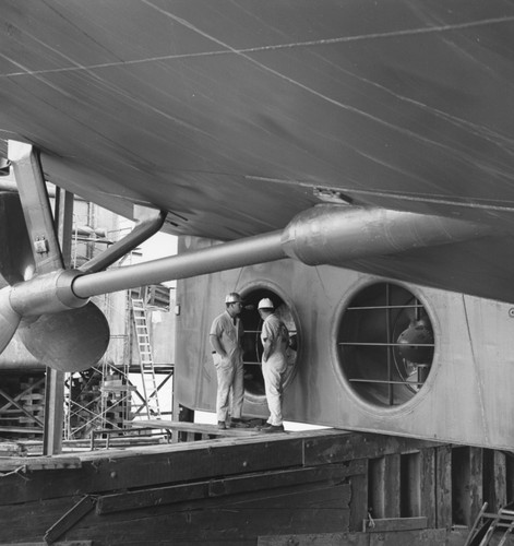 View of stern thrusters in skeg of Global Marine Inc.'s Glomar Challenger while on ways just before the launch 23 March [1968] in yards of Livingston Shipbuilding Co., Orange, Texas. Thruster tunnels are 57 inches in diameter. Starboard screw also is visible in photo. Similar pair of thrusters is located in bow of vessel. Computer-controlled thrusters will hold ship on station during drilling of core holes in up to 20,000 feet of water in Atlantic and Pacific Oceans during Deep-Sea Drilling Project. The Global Marine-designed ship has a length of 400 feet, beam of 65 feet, and displacement of 10,500 tons