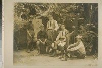 The Sire and his assistants. From left to right. Haig Patigian, Camp Cartoonist; Ed. J. Duffey, Master of Lights; Frank Mathieu, Stage Director; Herman Scheffauer, Sire; Geo. Lyon, Master of Properties. Bohemian Grove. [Photograph by Gabriel Moulin. ]