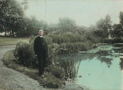 Posing near a pond