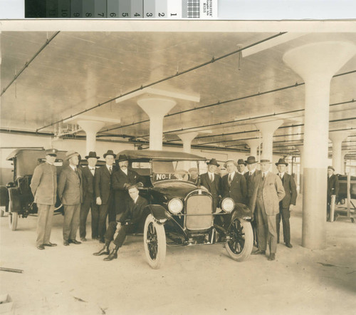First car out of the Durant factory, 1922 [picture] : Mayor Davie with hand on car door