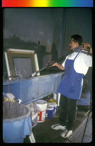 Artist Cleaning a Screen