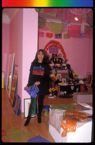 Hanging Papel Picado for Day of the Dead