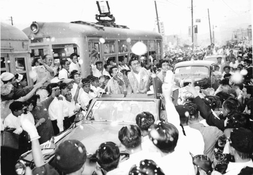 Parade honoring Ben Mitsuyoshi and Harvey and Howard Zenemira in Hitoshima, Japan