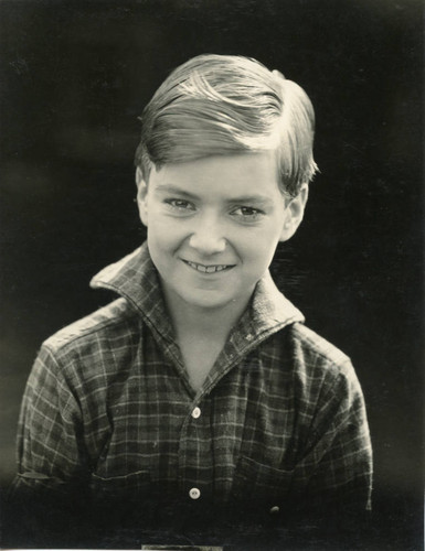 Studio portrait of Micky Moore age 8