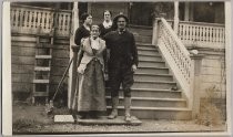 Pedro A. Bernal and family on steps of house, Route 1, San Jose, California