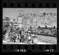 Walt Disney and Louis B. Lundborg opening Disneyland's "It's a Small World" ride, Anaheim, 1966