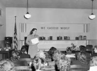 1947 - Novella Nicholson, Director of Secondary Education, speaks to a group of parents