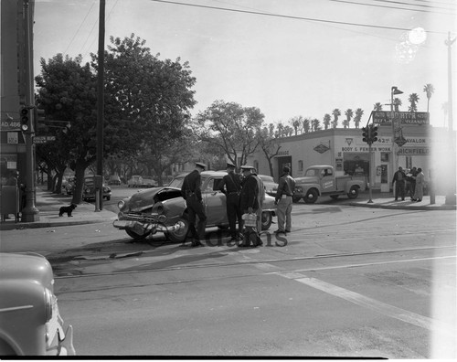 Officers at an auto accident scene, Los Angeles, 1955