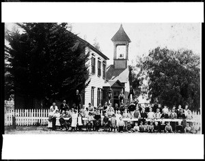 View of students posing in front of the LaDow School in Los Angeles, ca.1885