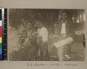 Group portrait of South Sea teacher and family, Kalaigolo, Papua New Guinea, ca. 1908-1910