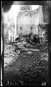 Damaged church through the doorway, France, ca.1916