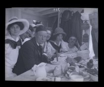Henry Meade Bland at dining table with students