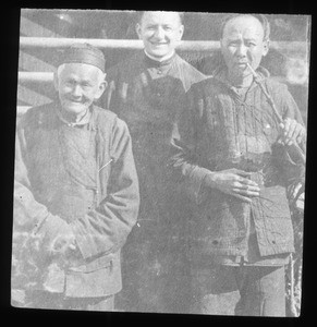 Group portrait of a Maryknoll priest and two Chinese men, China, ca. 1918-1938