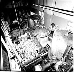 Unidentified apple processing plant with large equipment