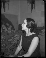 Artist Maroussia Valero seated in profile, circa 1932