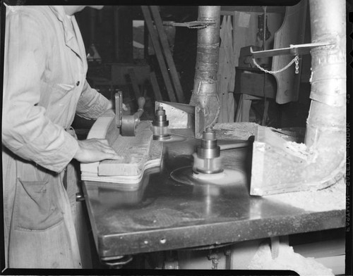 Machinist working with milling machine